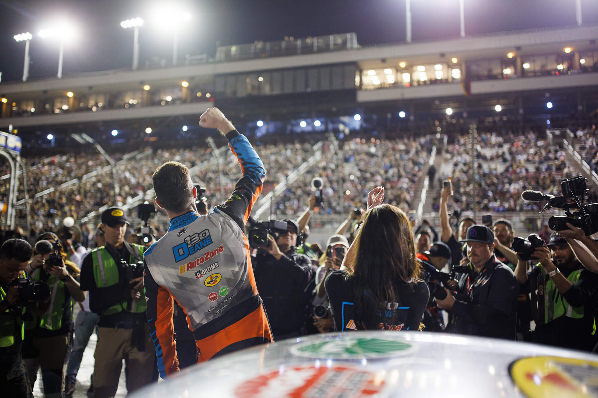 James Deane stands in front of a crowd at 2024 Formula Drift Irwindale