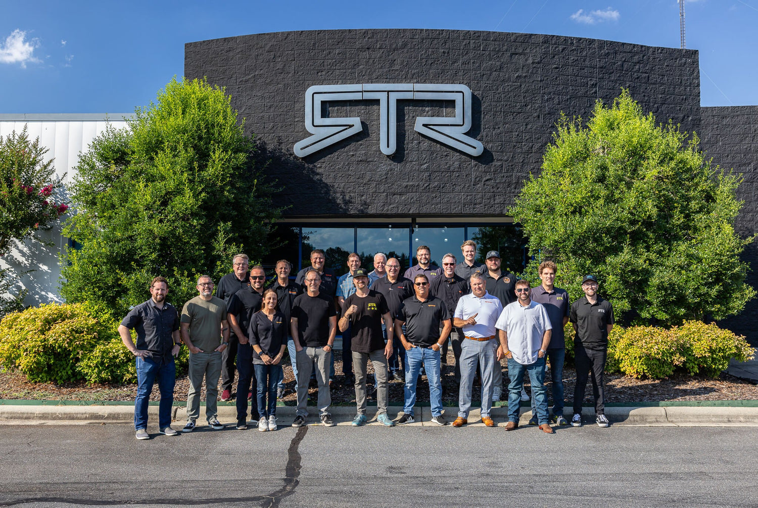 Vaughn and Fox Factory team stand in front of the RTR Lab in Concord, NC