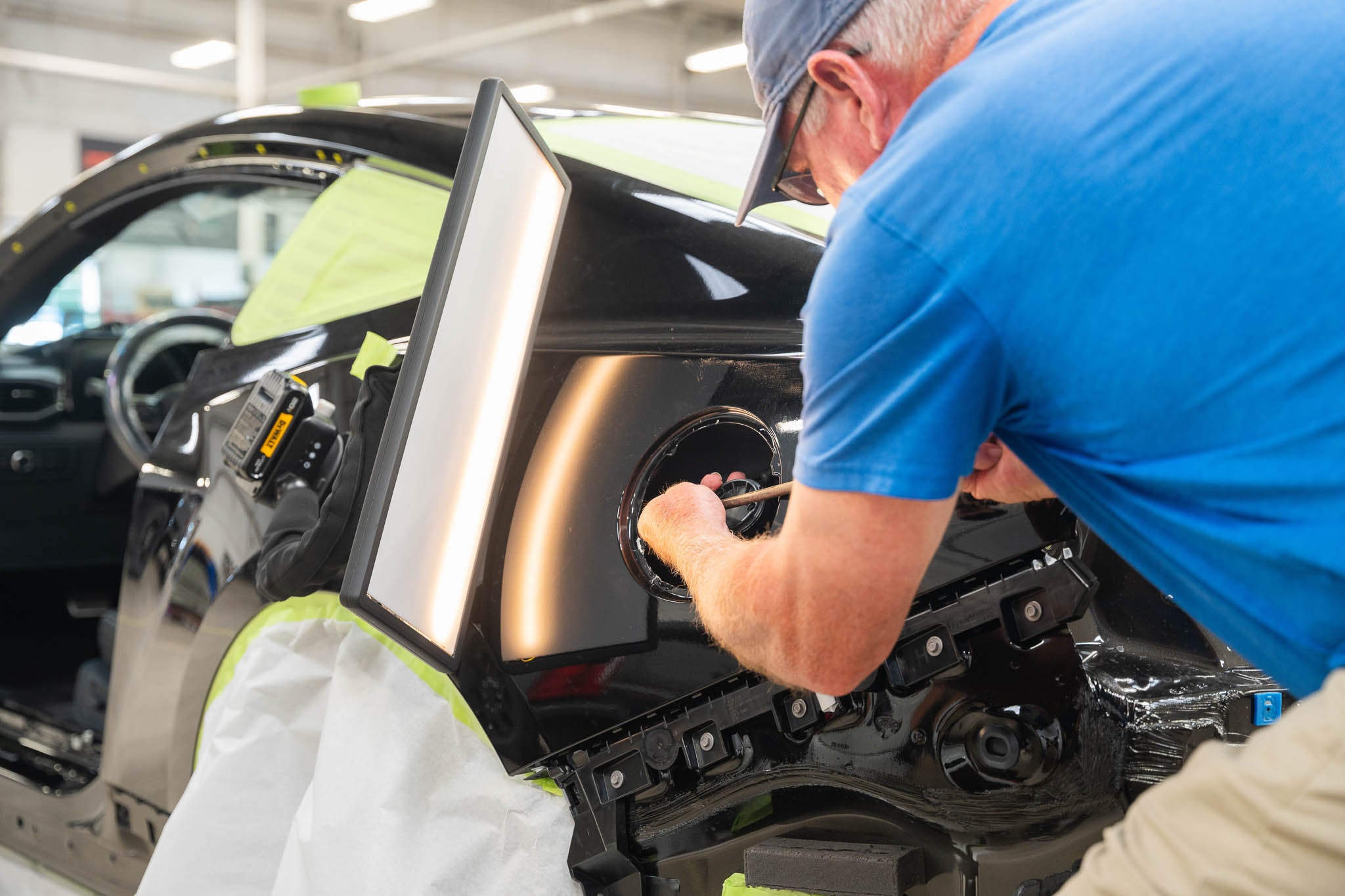 Man disassembles a 2025 S650 Mustang to be built into a Mustang RTR