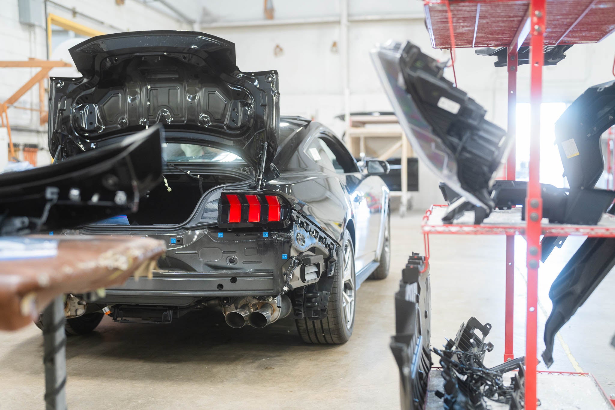 A Mustang being disassembled for the Mystichrome paint process offered by RTR