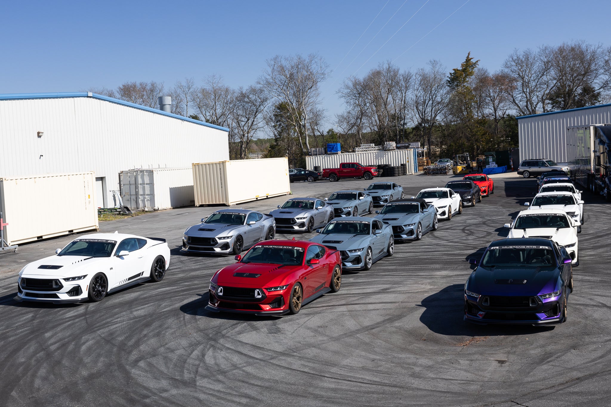 A lineup of Mustang RTRs at the RTR Lab