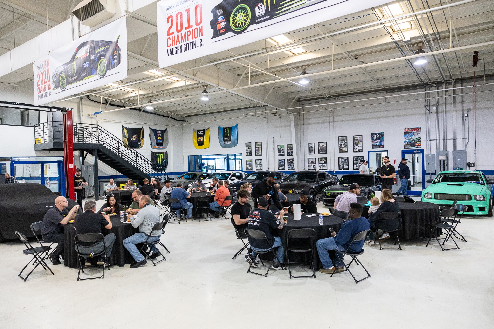 RTR Owners grabbing lunch at the RTR Owners Day and eating in the RTR Lab