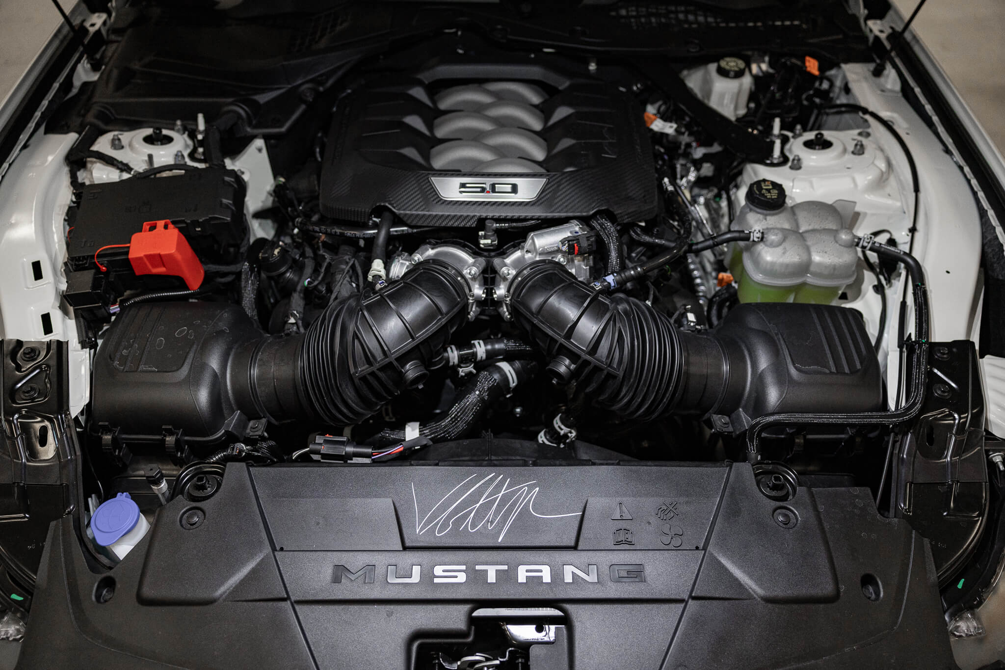 Vaughn Gittin Jr.'s signature in the engine bay of a 2025 Mustang RTR Spec 2