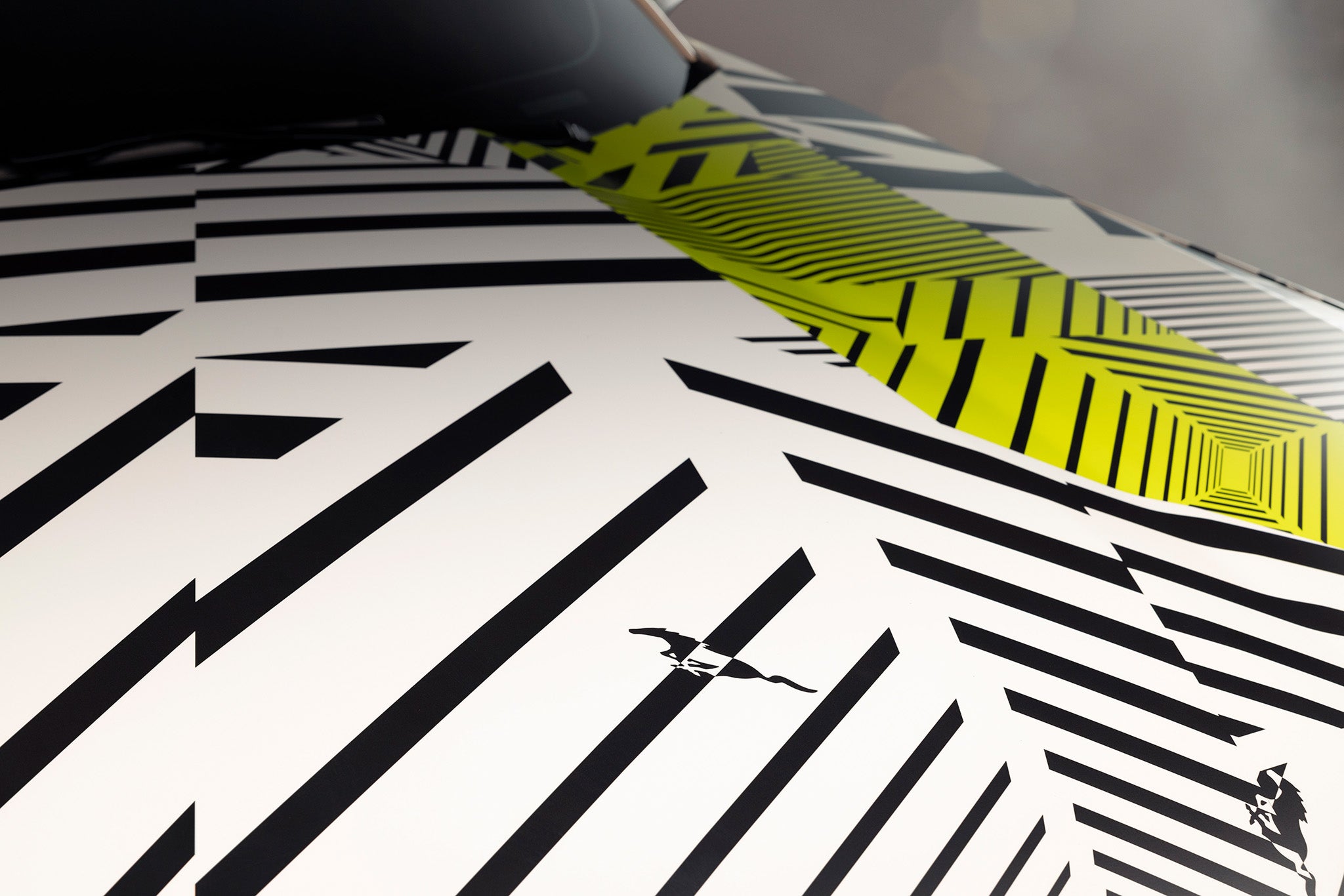 Detailed view of the Mustang RTR's hood in Dazzle camo with nods to the Iconic Ford Mustang logo