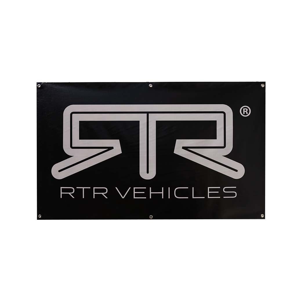 RTR Garage Banner with grey text on a black background, featuring durable vinyl and pre-installed grommets for easy hanging.